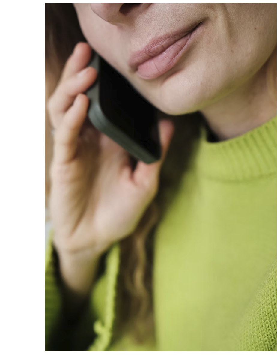 Woman on the phone, listening carefully